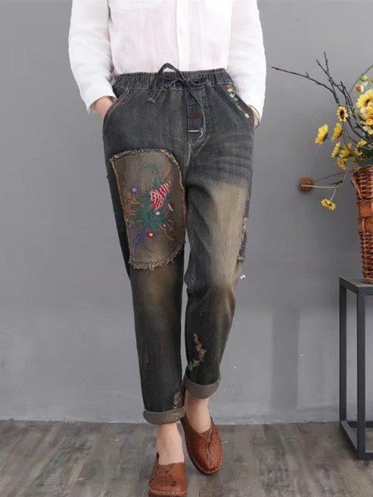 

Ripped Embroidered Vintage Jeans
